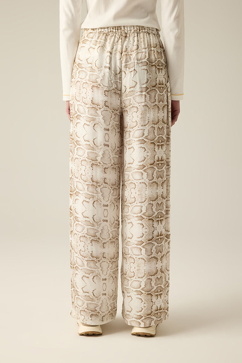 Women's viscose trousers with snake print