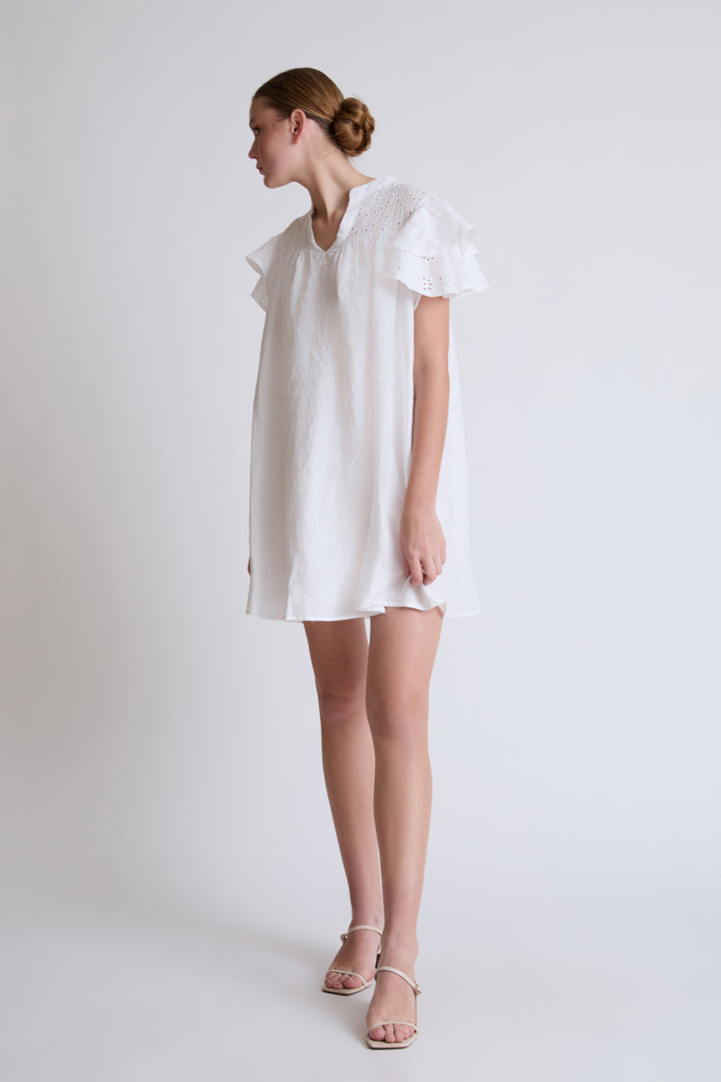 Lycra dress with broderie anglaise and flounce sleeves