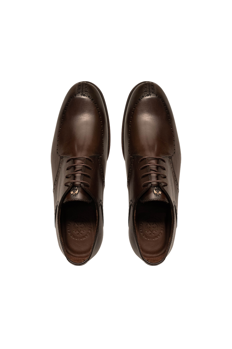 Eleganter Derby-Brogue mit Lyra-Lochung, Rahmennaht und Lederlaufsohle.