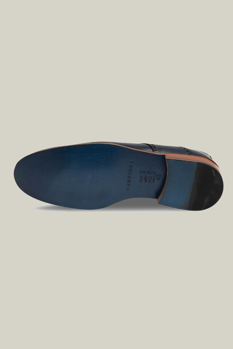 Lir delikli, welt dikişli ve deri dış tabanlı şık Derby brogue.
