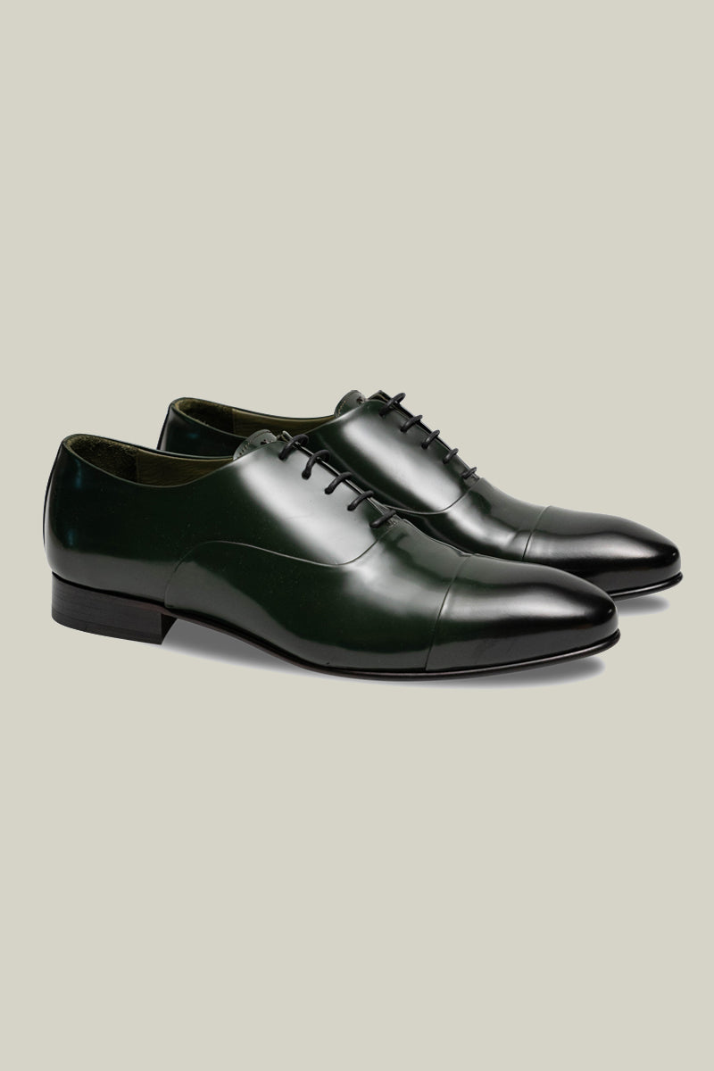 Elegant patent leather oxfords, 75% handmade, in black-red or dark green.