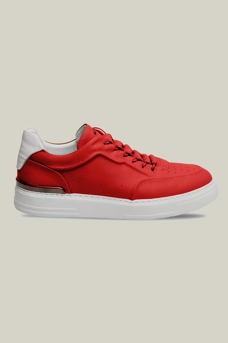 Leather sneakers with concealed lacing.