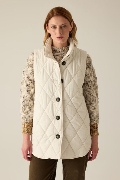 Women's quilted vest with buttons in cream