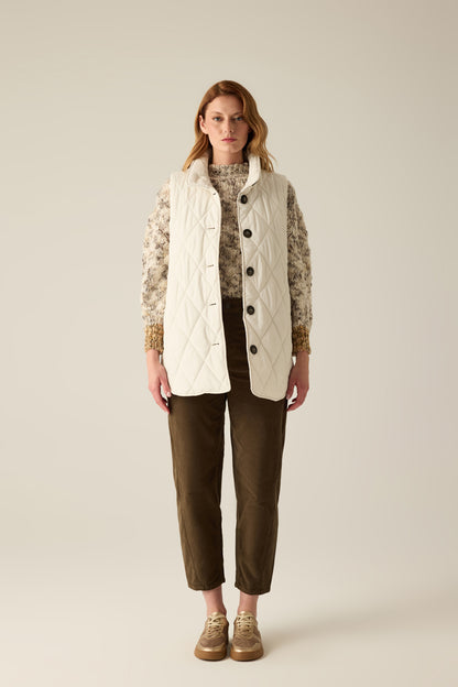 Women's quilted vest with buttons in cream