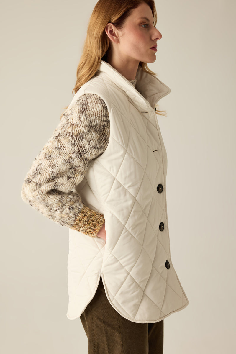 Women's quilted vest with buttons in cream