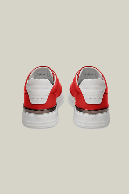 Leather sneakers with concealed lacing.