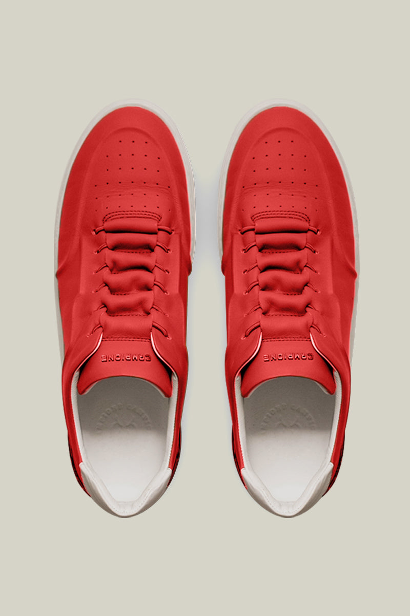 Leather sneakers with concealed lacing.
