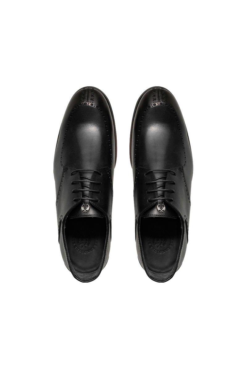 Lir delikli, welt dikişli ve deri dış tabanlı şık Derby brogue.