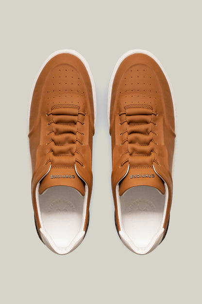 Leather sneakers with concealed lacing.