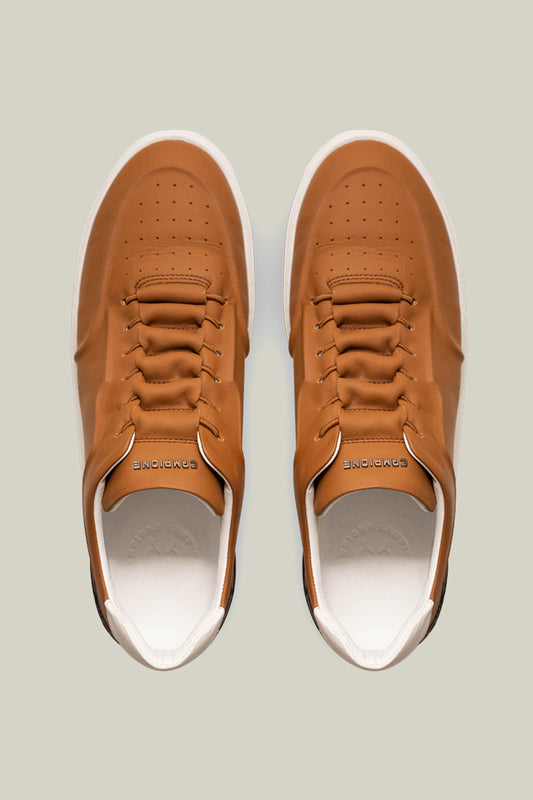 Leather sneakers with concealed lacing.