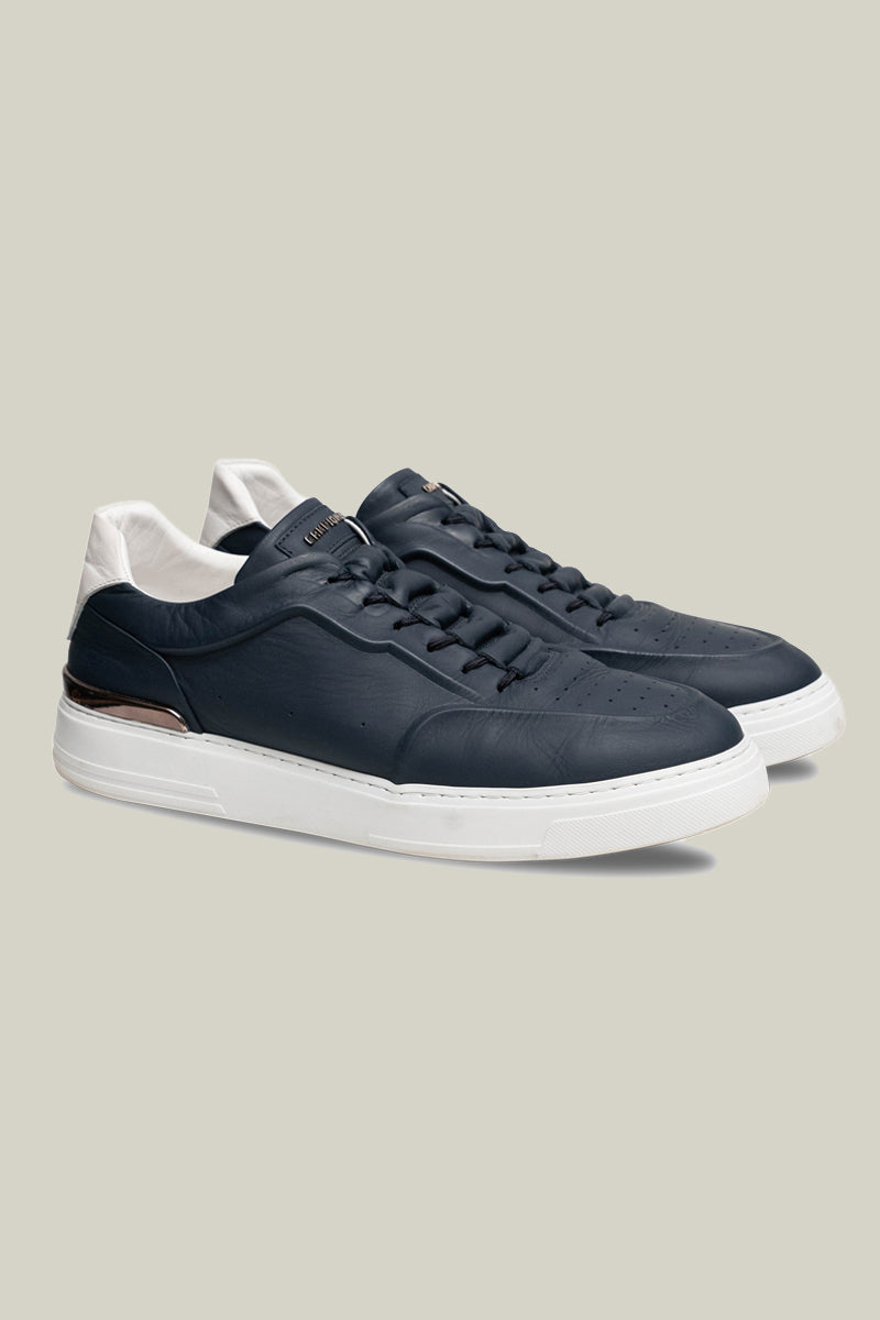 Leather sneakers with concealed lacing.