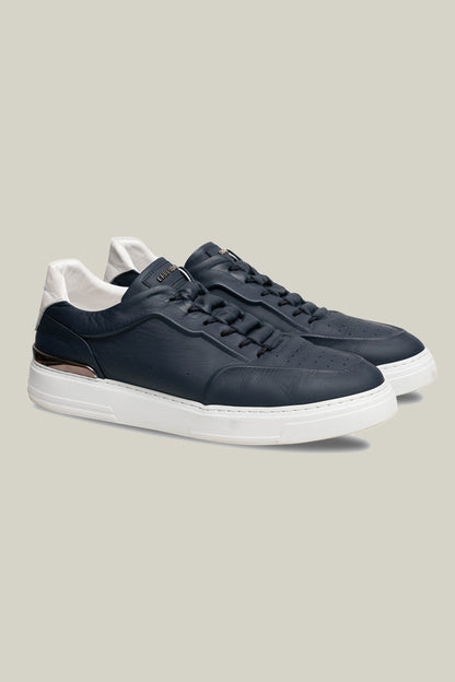 Leather sneakers with concealed lacing.