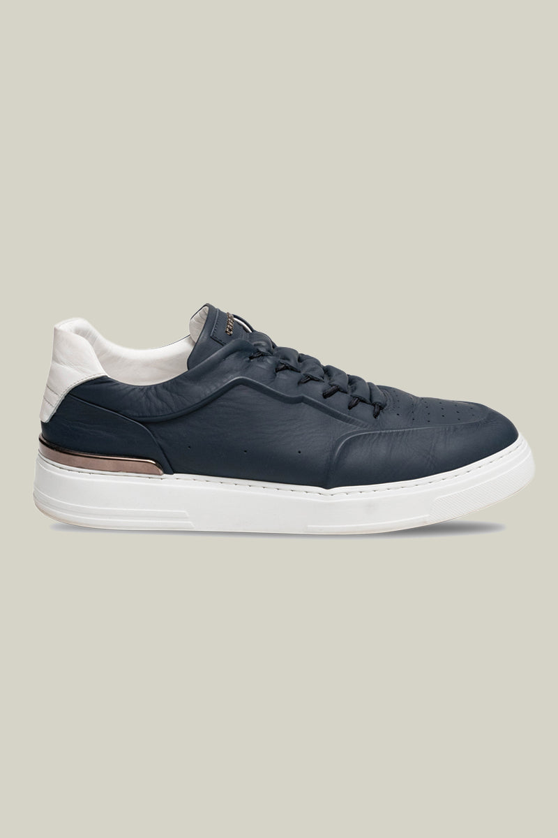 Leather sneakers with concealed lacing.