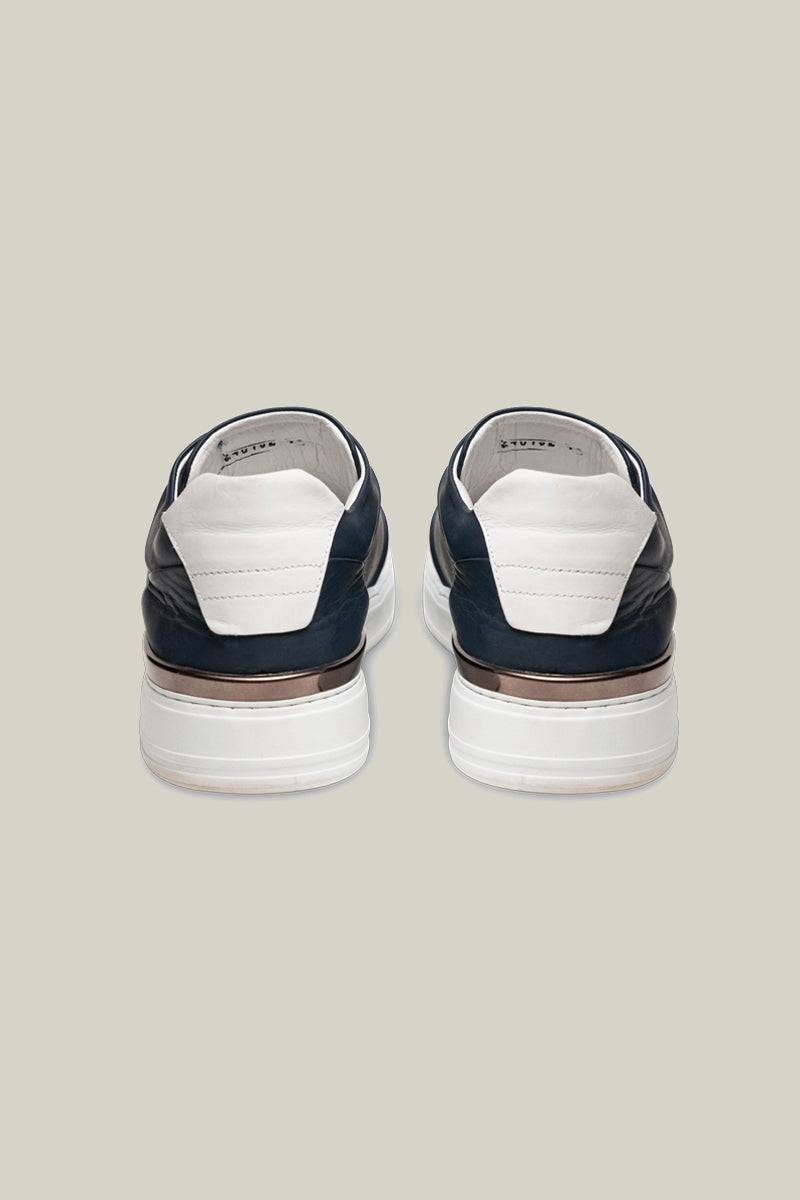 Leather sneakers with concealed lacing.