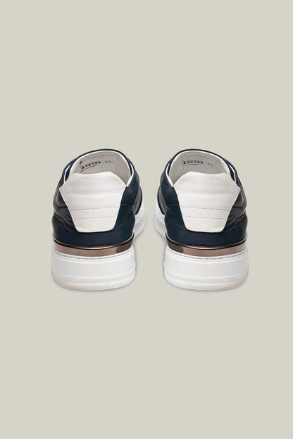 Leather sneakers with concealed lacing.