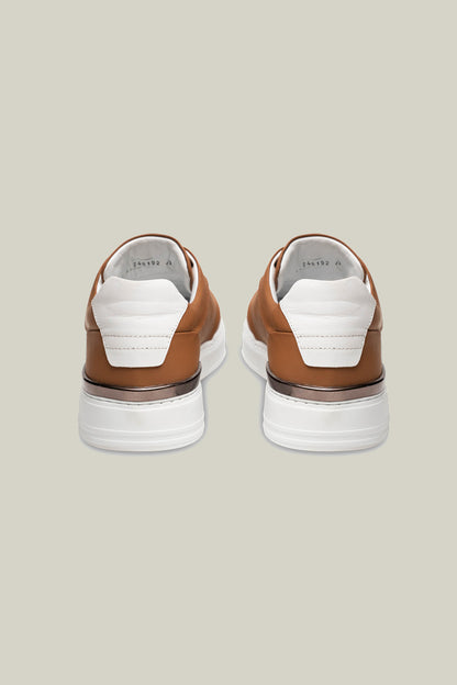 Leather sneakers with concealed lacing.