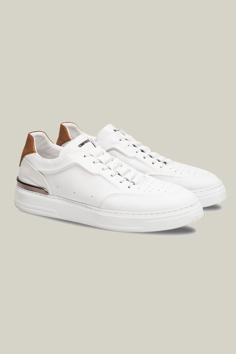 Leather sneakers with concealed lacing.