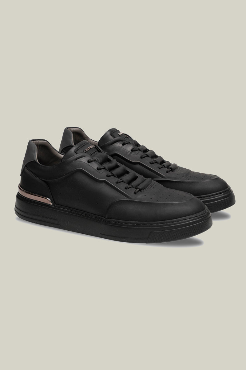 Leather sneakers with concealed lacing.