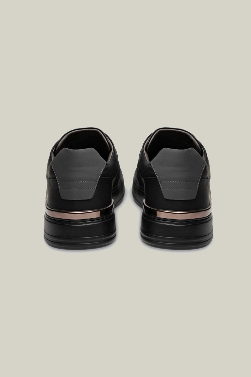 Leather sneakers with concealed lacing.