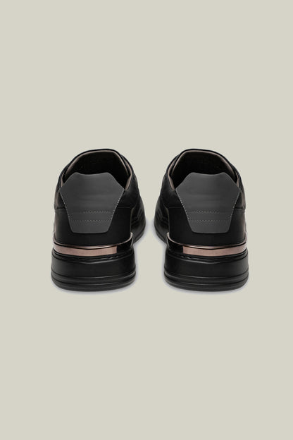 Leather sneakers with concealed lacing.