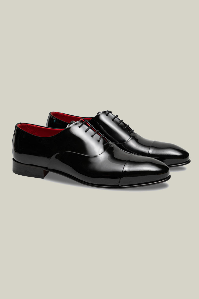 Elegant patent leather oxfords, 75% handmade, in black-red or dark green.