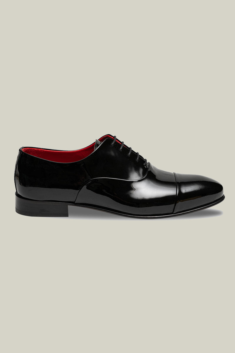 Elegant patent leather oxfords, 75% handmade, in black-red or dark green.